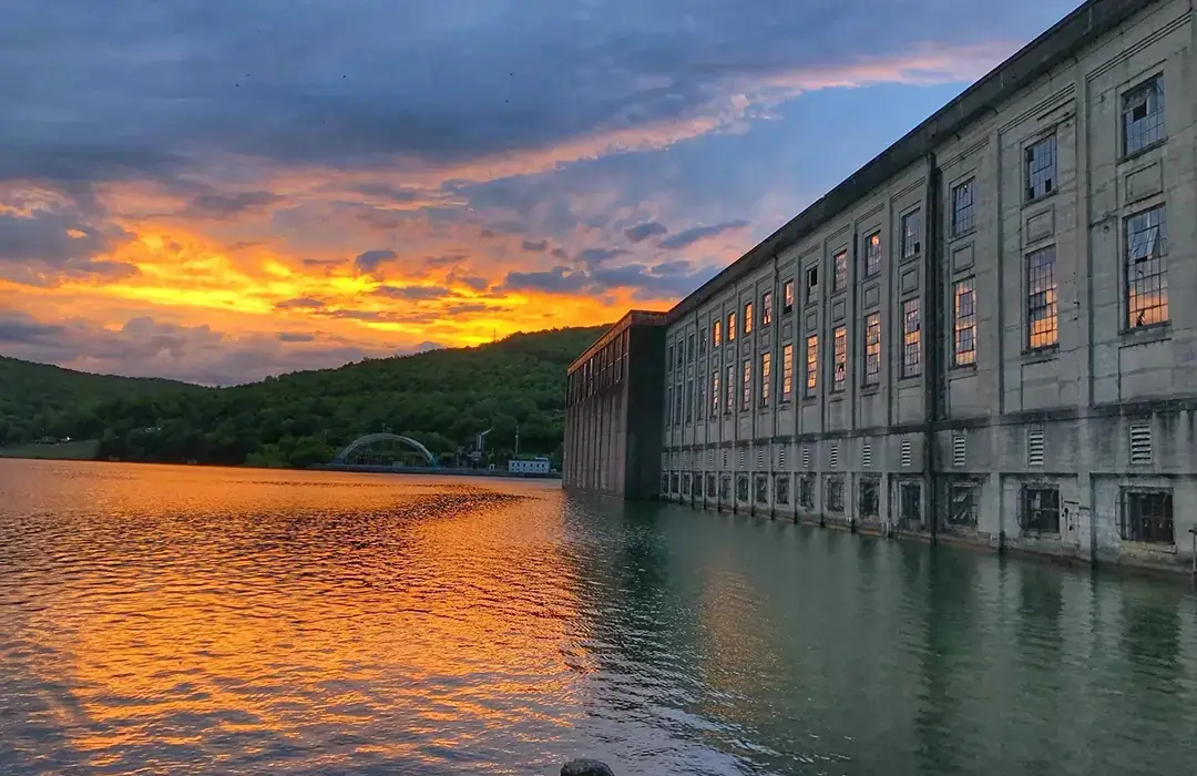 The 1913 Hales Bar Dam powerhouse on the Tennessee River at sunset