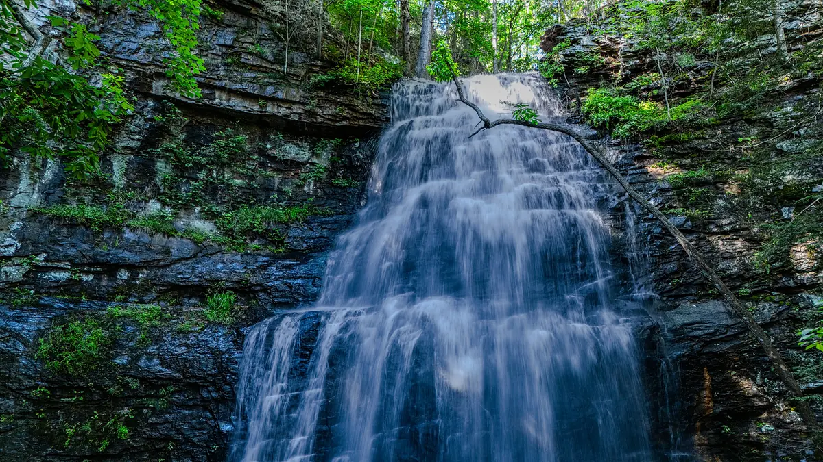 Tiered waterfall over mossy rock near Foster Falls